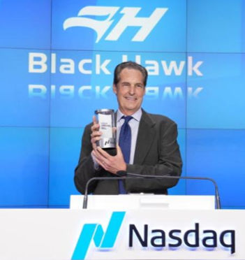 Kent Kaufman ringing the Nasdaq bell for Black Hawk's IPO